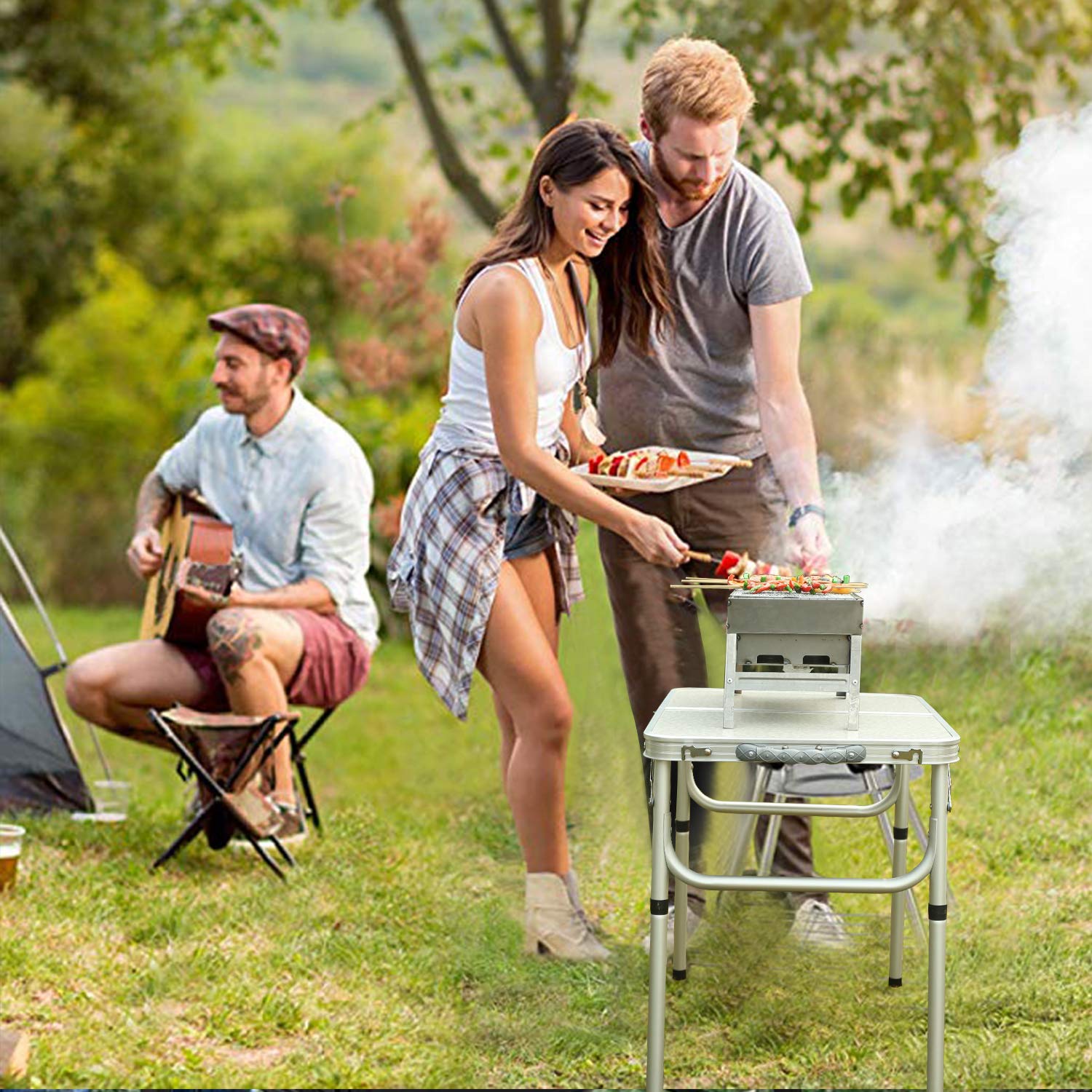 REDCAMP portable charcoal grill at an outdoor picnic